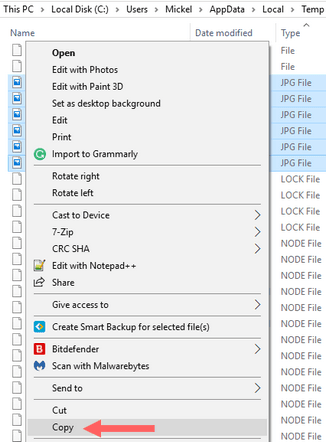 نسخ الصور من المجلد بعد تصغير حجم عدة صور